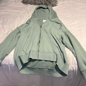 green thin zip up hoodie